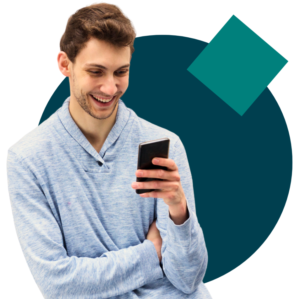 man looking at phone smiling